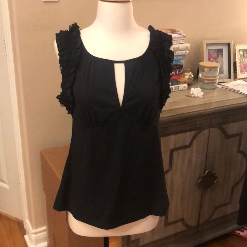 BCBG black top with ruffle detail on shoulders